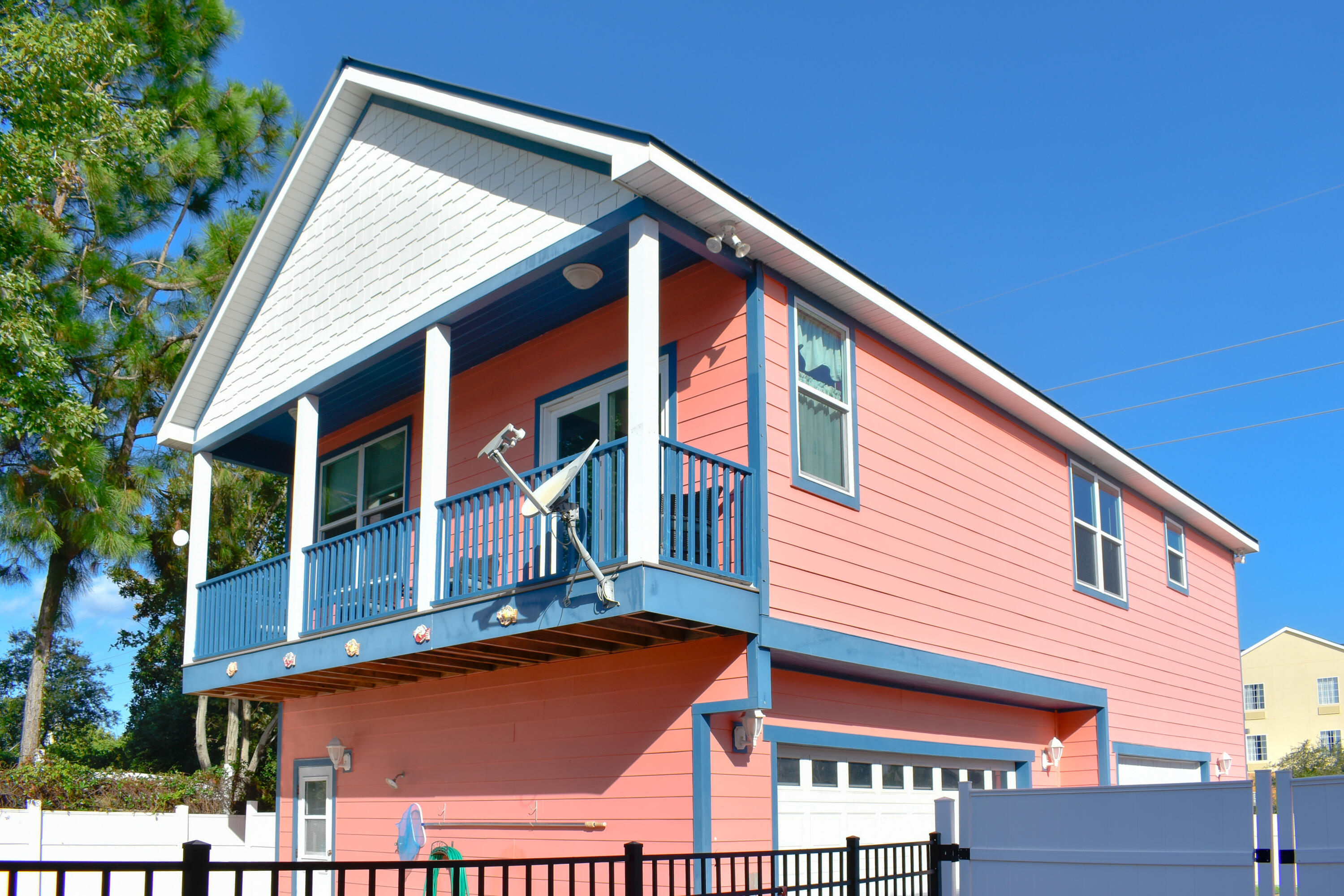 4455 Luke Avenue Destin, FL 32541 - Photo 3 of 44 a view of a house with a roof deck