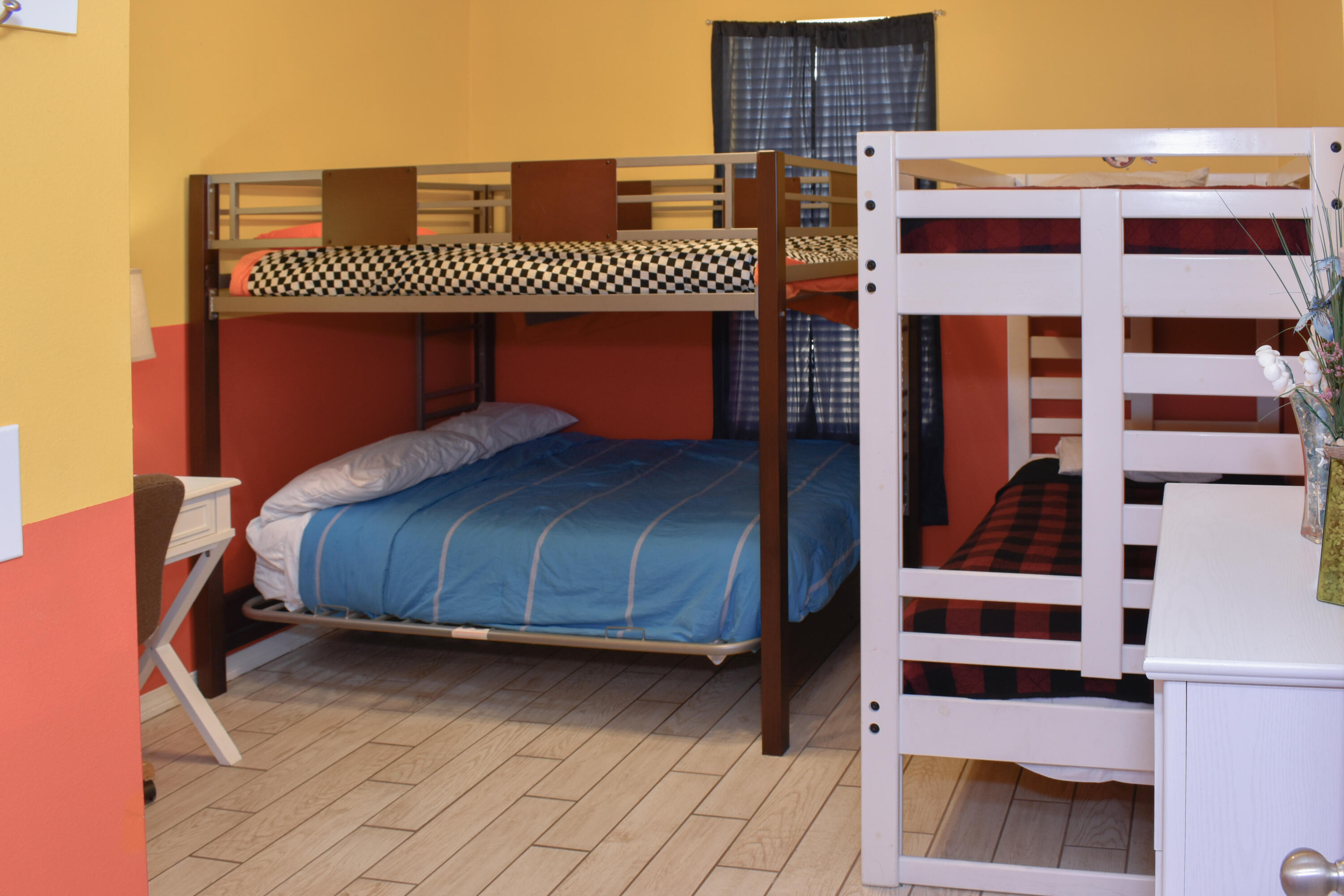 4455 Luke Avenue Destin, FL 32541 - Photo 26 of 44 a bedroom with a bed and a walk in closet