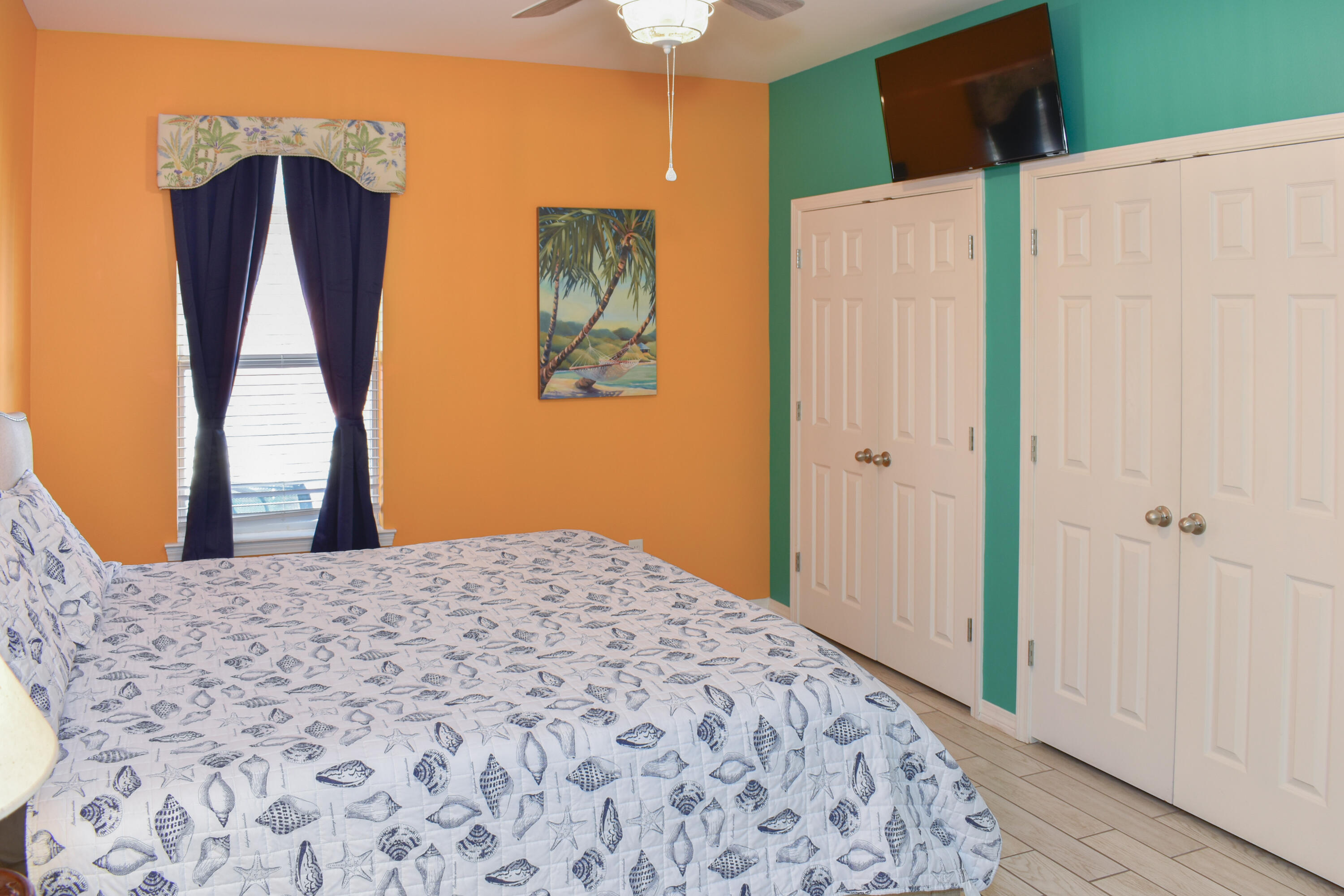 4455 Luke Avenue Destin, FL 32541 - Photo 30 of 44 a bedroom with a bed and a dresser