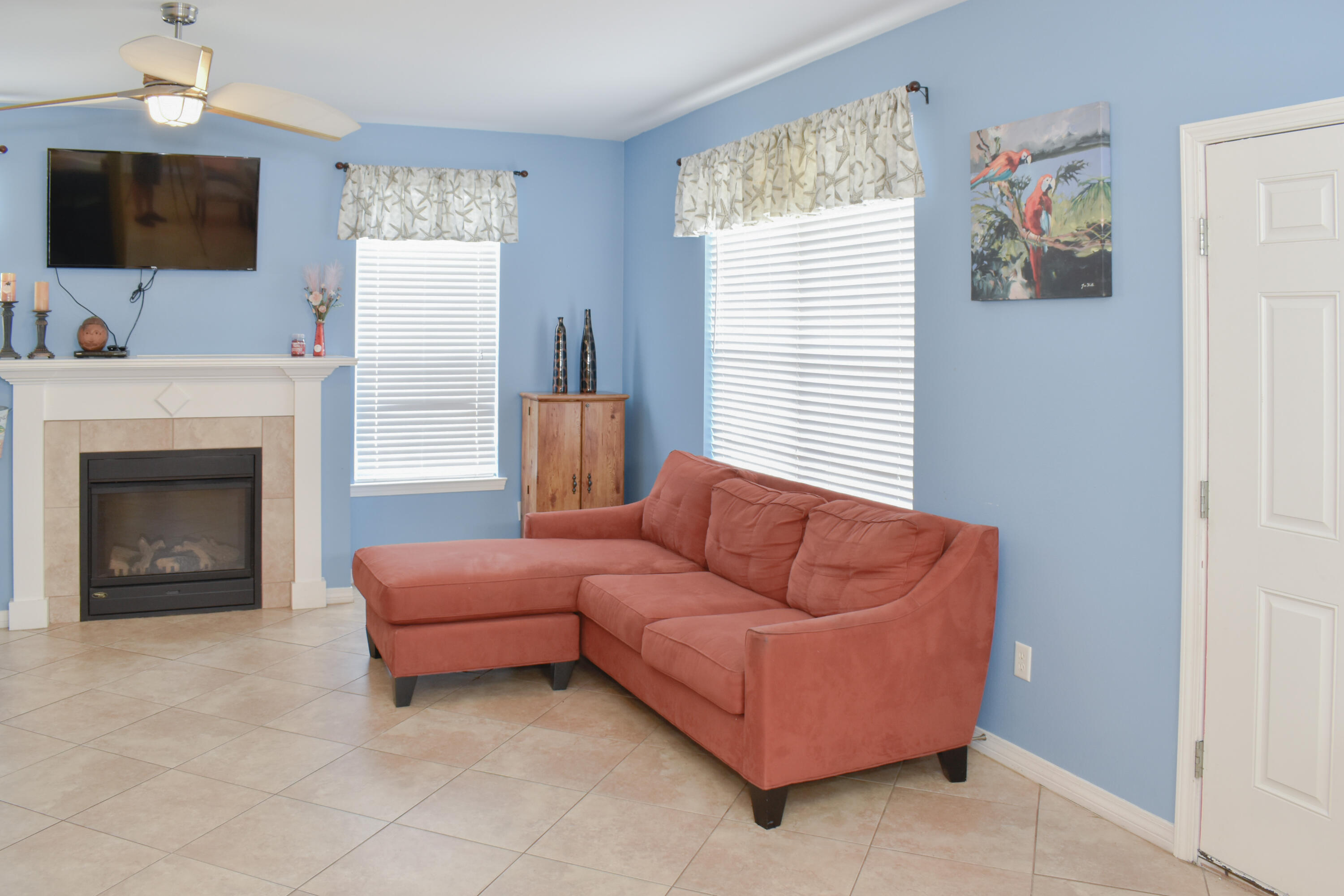 4455 Luke Avenue Destin, FL 32541 - Photo 32 of 44 a living room with furniture and a fireplace