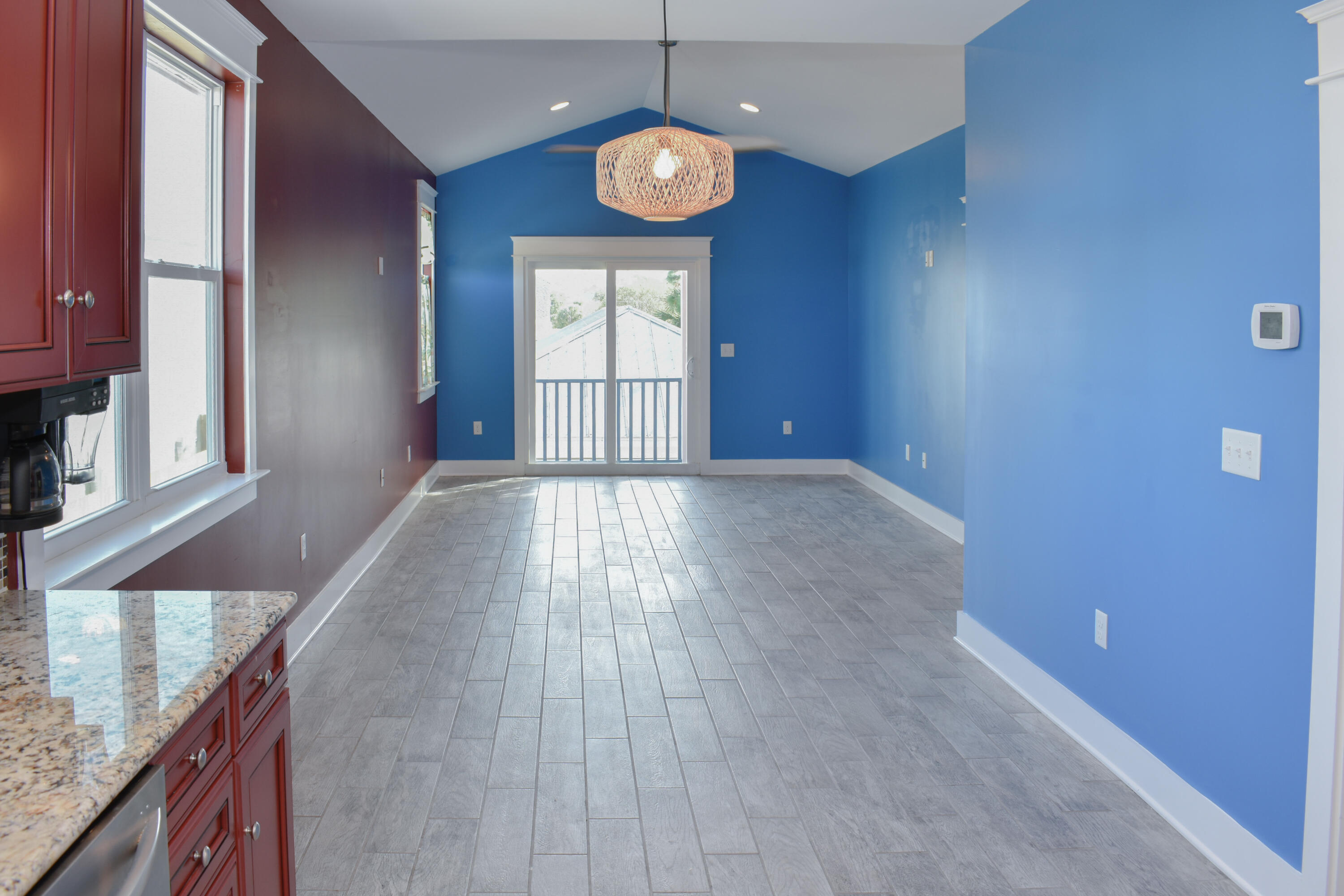 4455 Luke Avenue Destin, FL 32541 - Photo 36 of 44 a view of an empty room with window and wooden floor