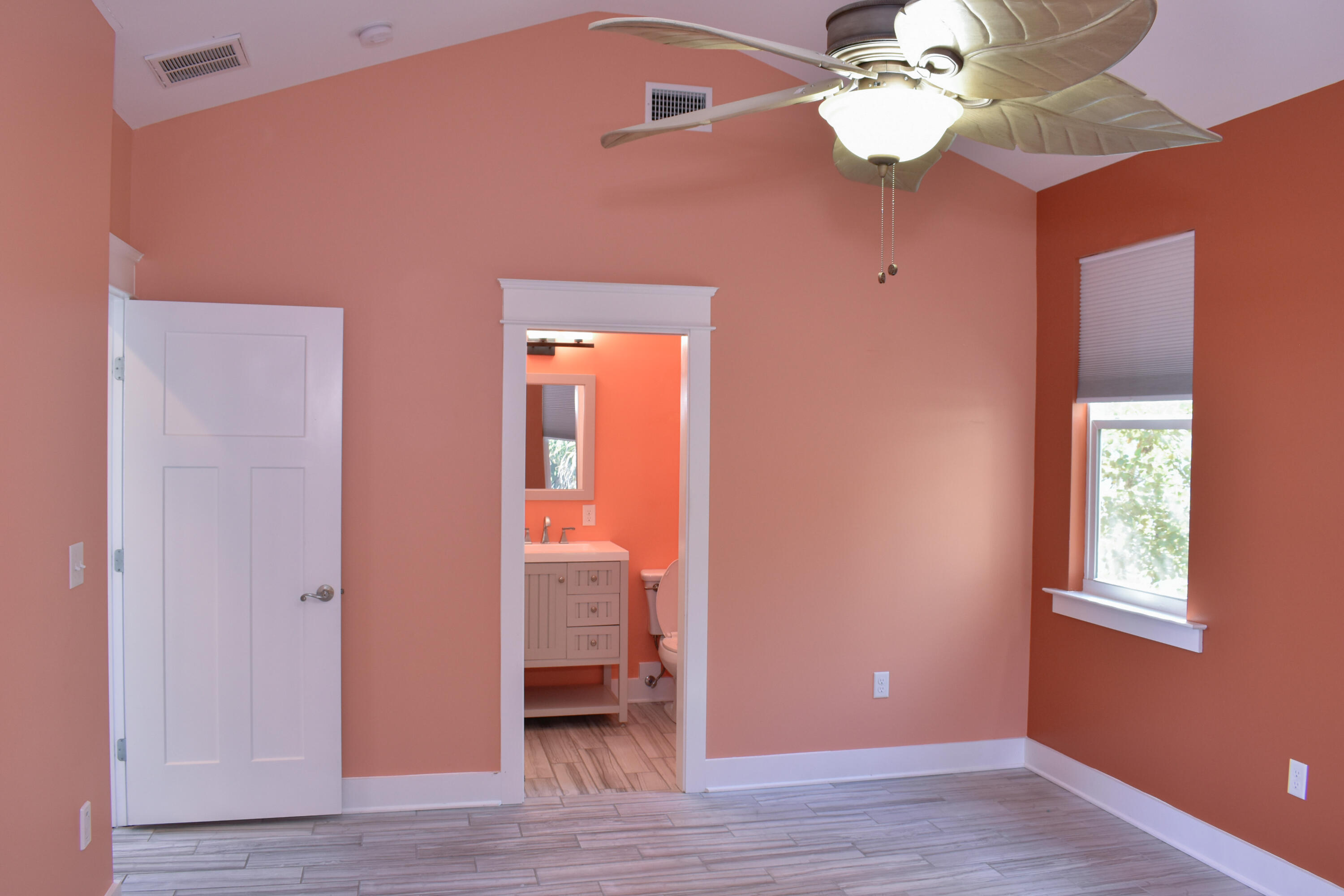 4455 Luke Avenue Destin, FL 32541 - Photo 40 of 44 a view of a livingroom with a window and a ceiling fan