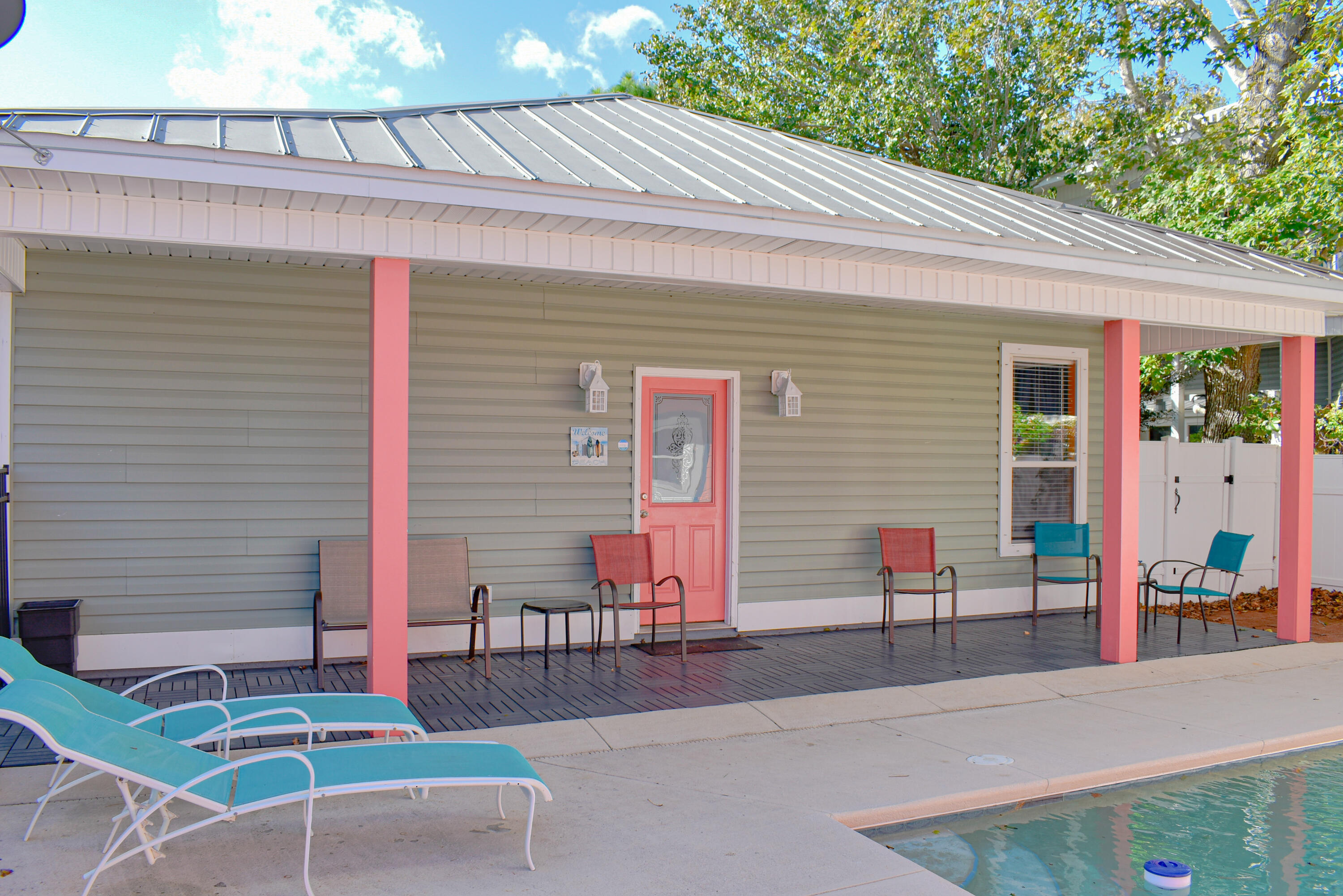 4455 Luke Avenue Destin, FL 32541 - Photo 5 of 44 a view of a patio with table and chairs