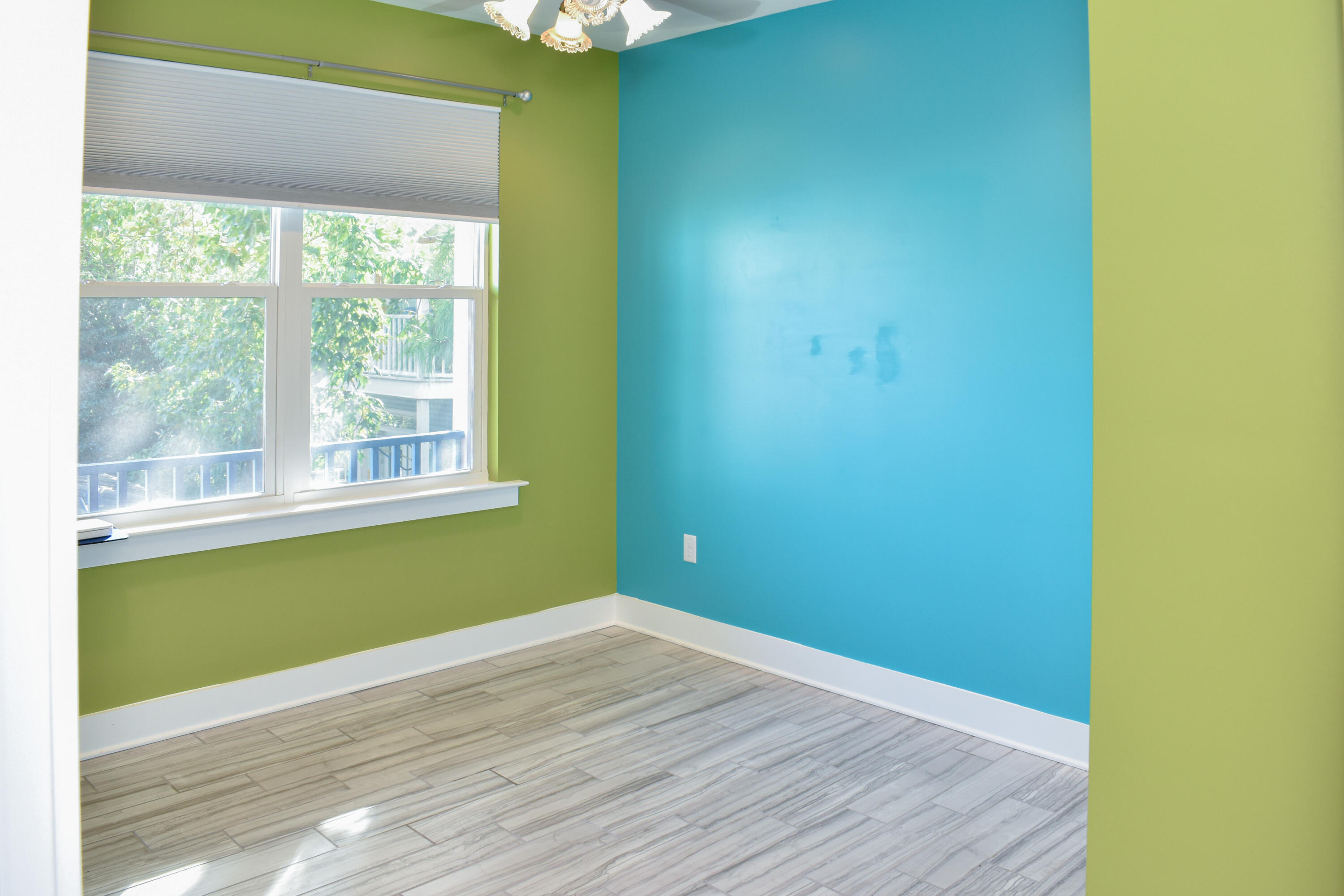 4455 Luke Avenue Destin, FL 32541 - Photo 43 of 44 a view of empty room with wooden floor and fan