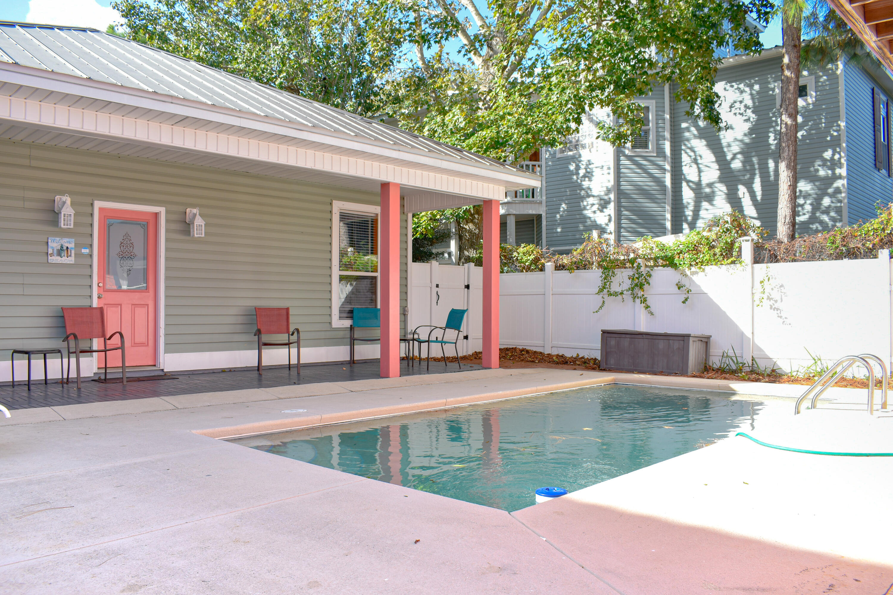 4455 Luke Avenue Destin, FL 32541 - Photo 6 of 44 a view of a swimming pool with a patio