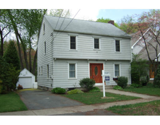 114 Maple Road Longmeadow, MA 01106 - Photo 1 of 9 a view of a house with a yard and potted plants