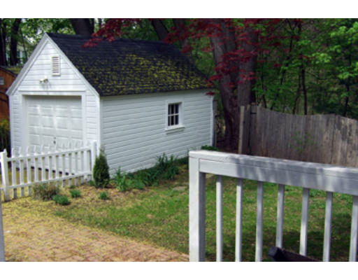 114 Maple Road Longmeadow, MA 01106 - Photo 7 of 9 a view of a small house with wooden fence