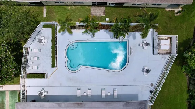 an aerial view of residential building with parking space