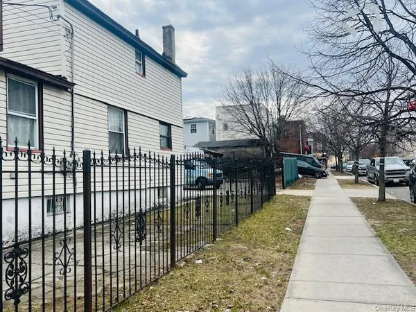 a view of a cars parked in front of a building