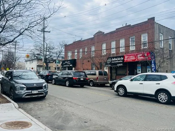 a view of cars parked in a parking lot