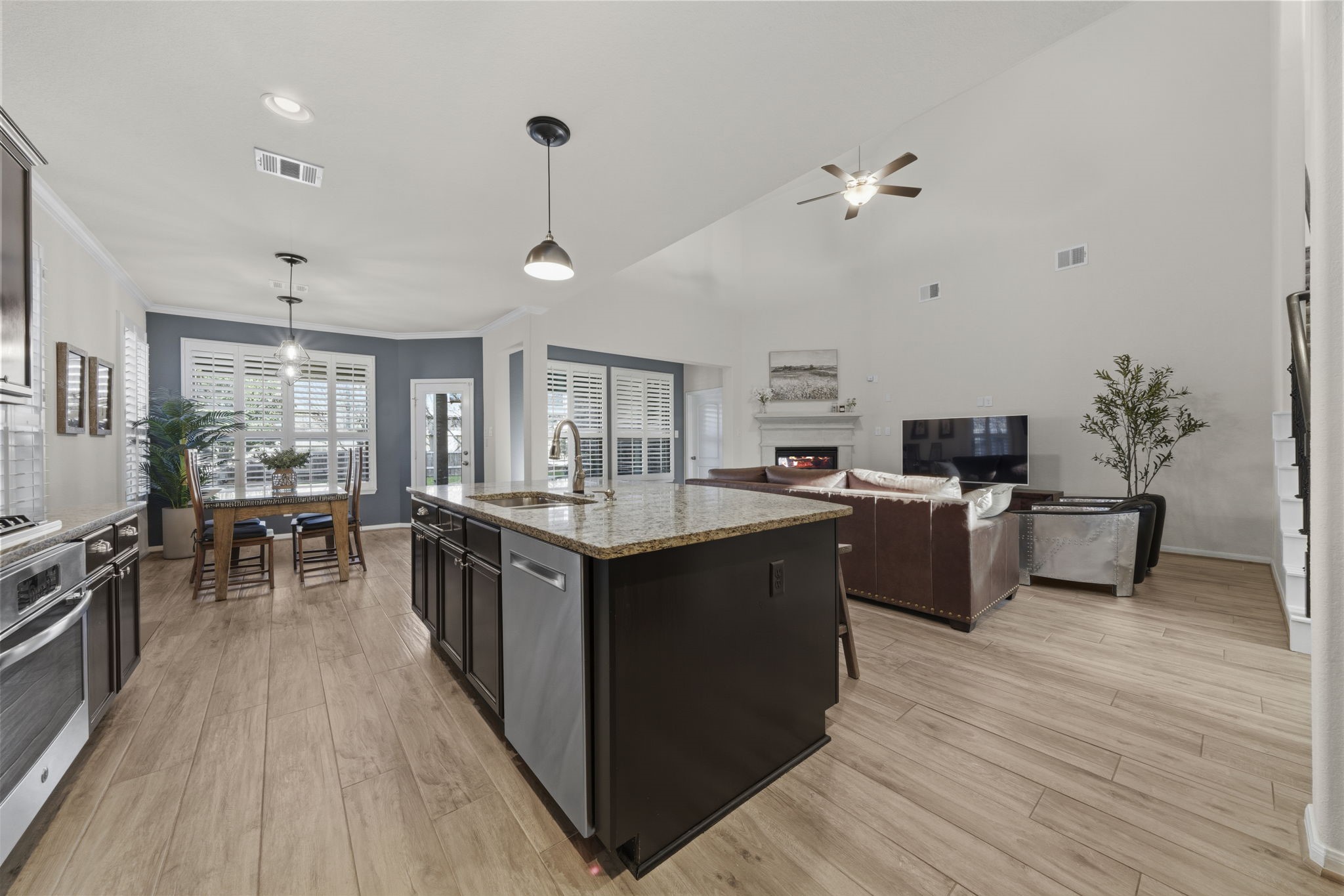 16731 Doubletree Ranch Drive Cypress, TX 77433 - Photo 12 of 44 Open concept living with living room, kitchen and dining room flowing seamlessly into a huge cohesive space.