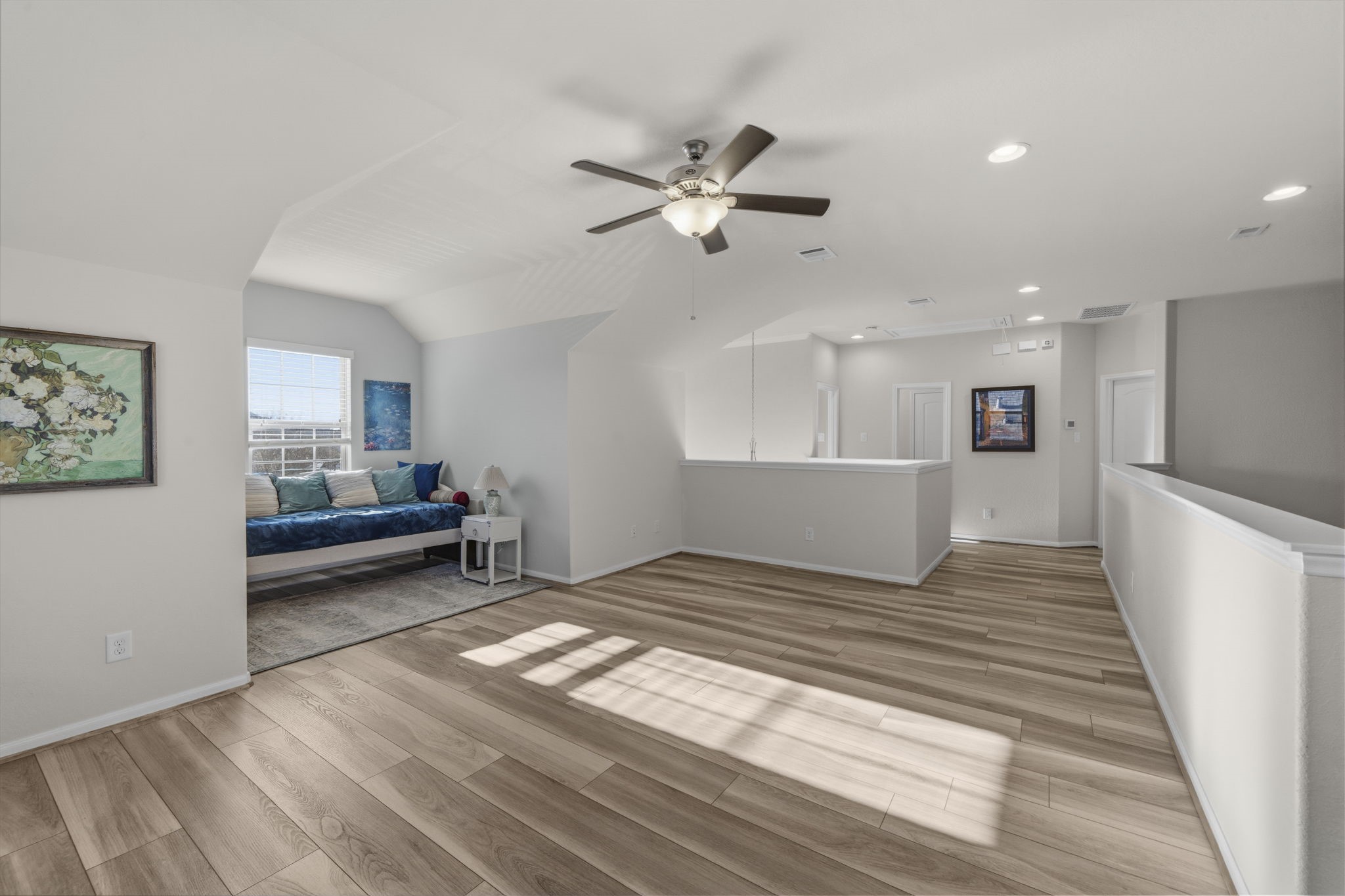 16731 Doubletree Ranch Drive Cypress, TX 77433 - Photo 22 of 44 This bright and spacious game room features new LVP flooring and recessed lighting. It features a cozy seating nook with window behind and ceiling fan, creating a comfortable and inviting space.