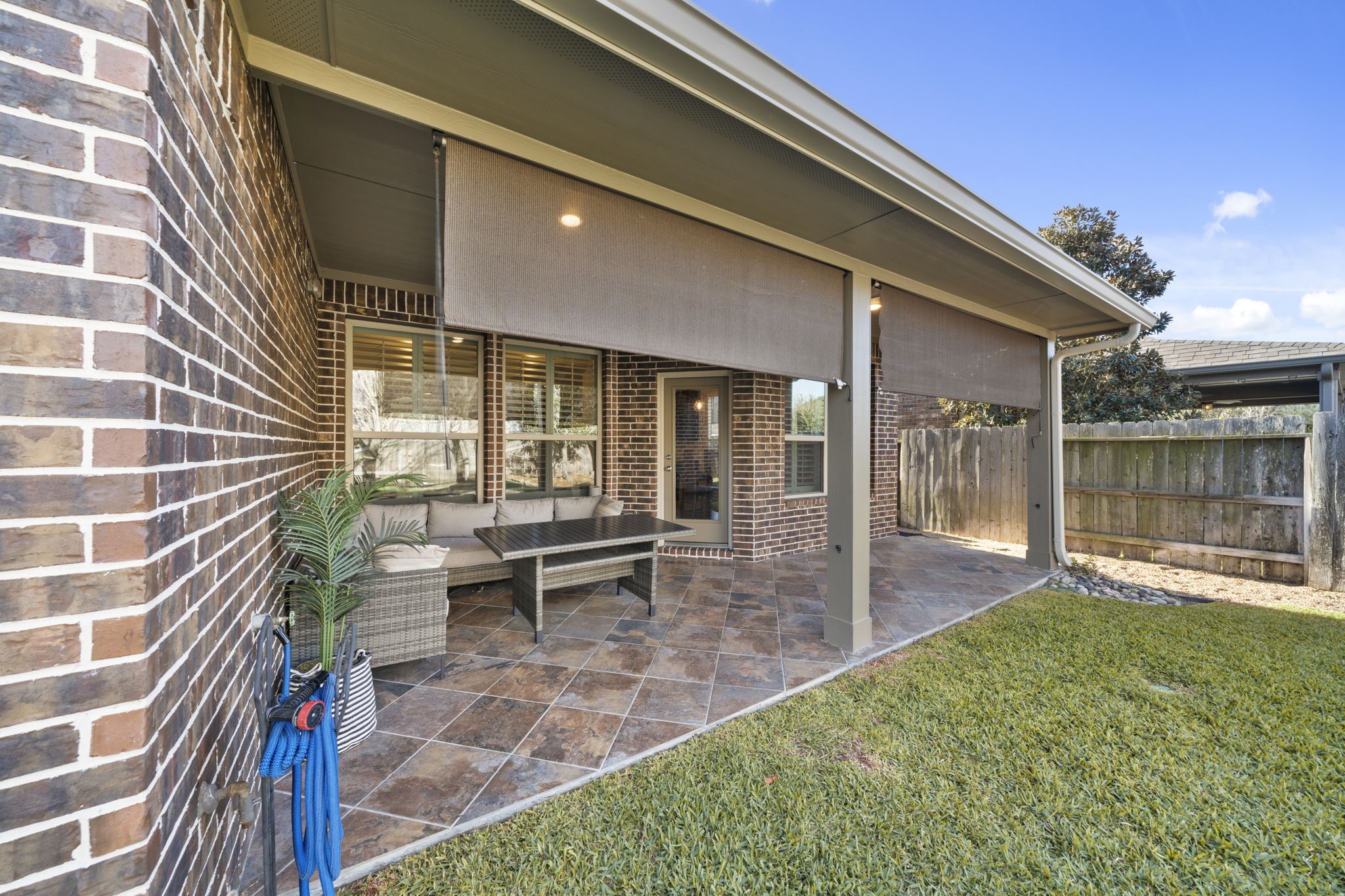 16731 Doubletree Ranch Drive Cypress, TX 77433 - Photo 31 of 44 The patio includes pull-down shades for extra privacy and sun protection.