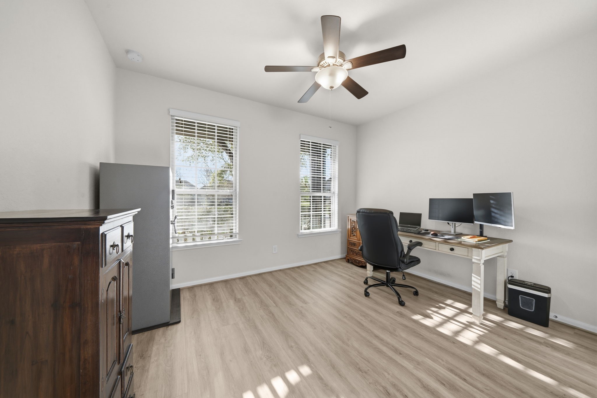 16731 Doubletree Ranch Drive Cypress, TX 77433 - Photo 4 of 44 Located right off the entrance, the first room is currently used as a home office, it has a closet, large ceiling fan and new LVP flooring.