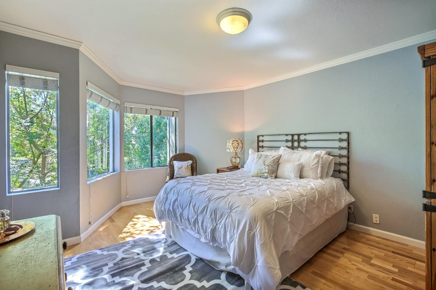 Braddock Court San Jose, CA 95125 - Photo 12 of 20 a bedroom with a bed and a large window