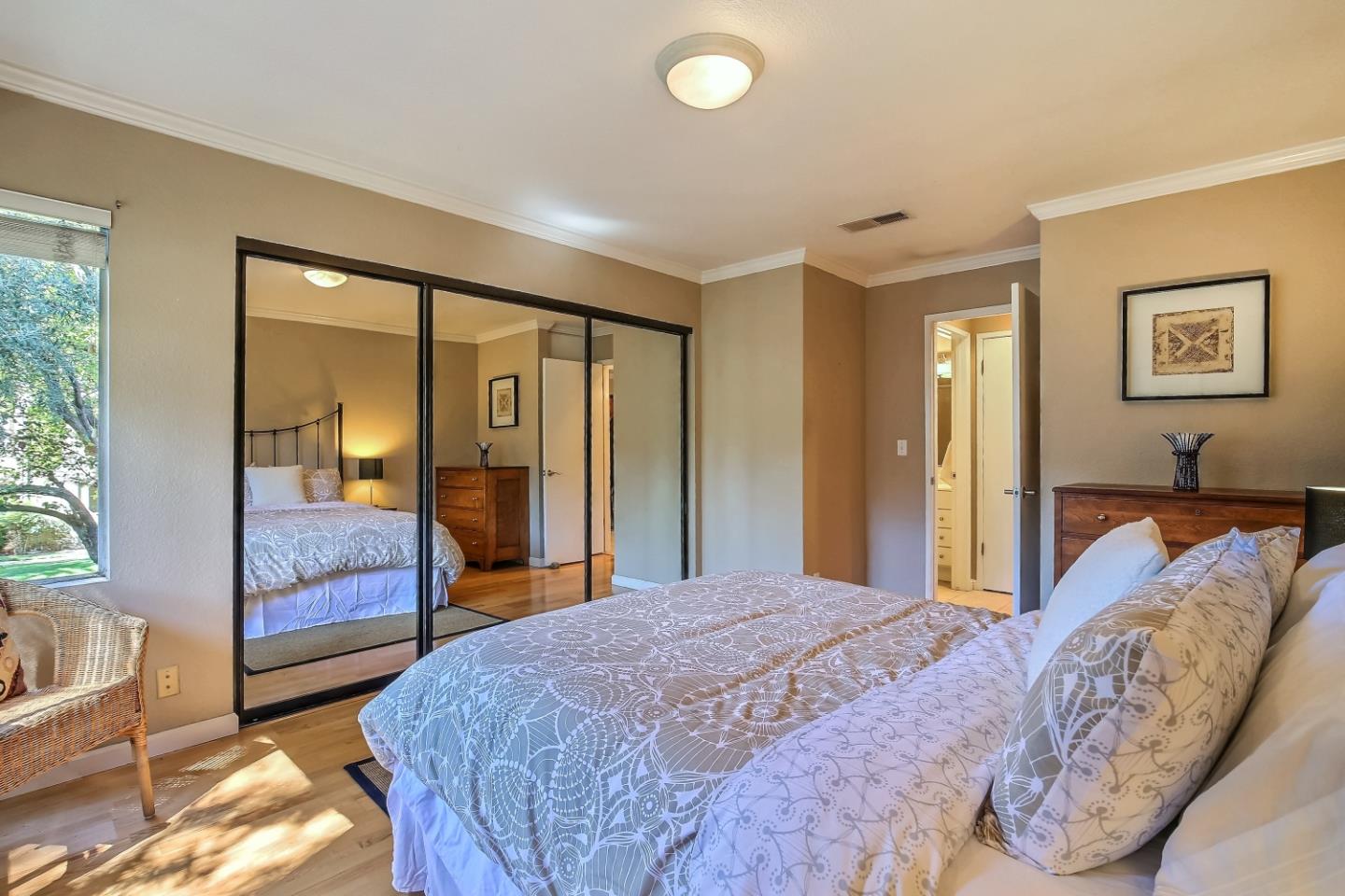 Braddock Court San Jose, CA 95125 - Photo 15 of 20 a bedroom with a large bed and a large window