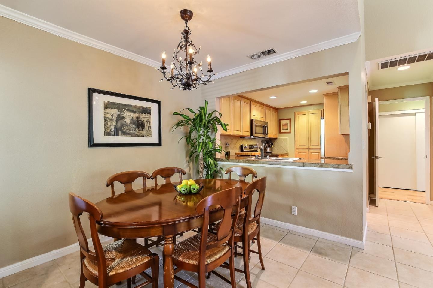 Braddock Court San Jose, CA 95125 - Photo 8 of 20 a view of a dining room with furniture and chandelier