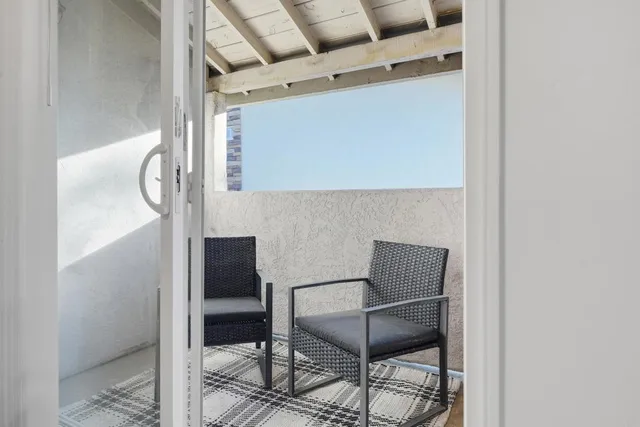 a room with table and chairs