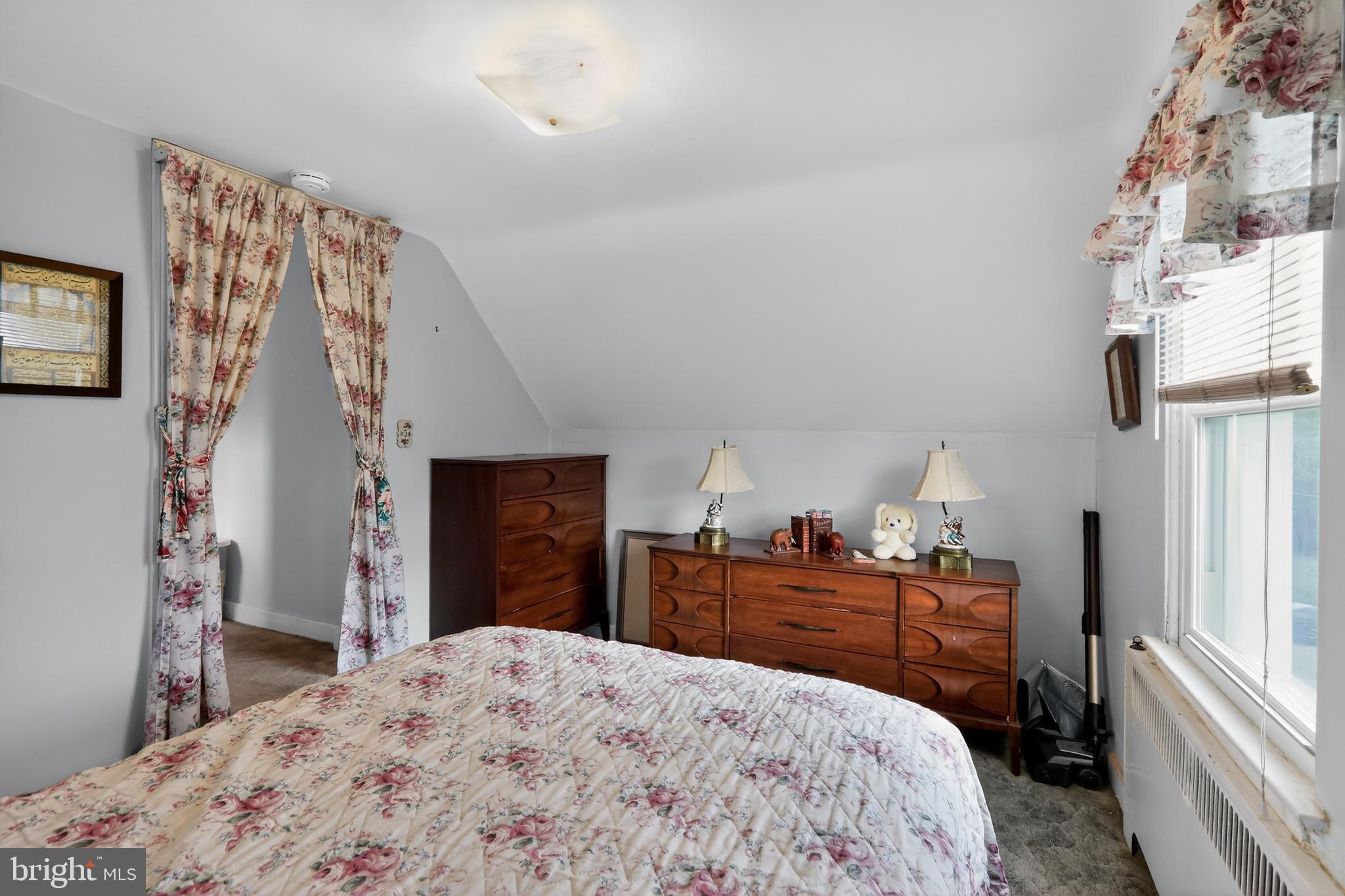 1424 Burmont Road Havertown, PA 19083 - Photo 27 of 37 a bedroom with a bed and a dresser