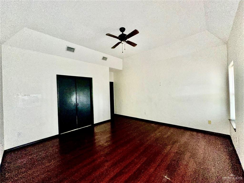 2109 Umar Avenue McAllen, TX 78504 - Photo 16 of 25 a view of empty room with wooden floor