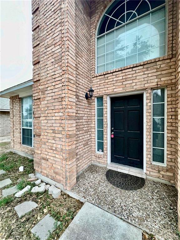 2109 Umar Avenue McAllen, TX 78504 - Photo 2 of 25 a front view of a house with a window