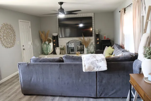 a living room with furniture and window