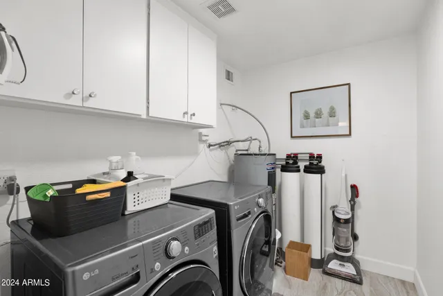 a view of room with washer and dryer