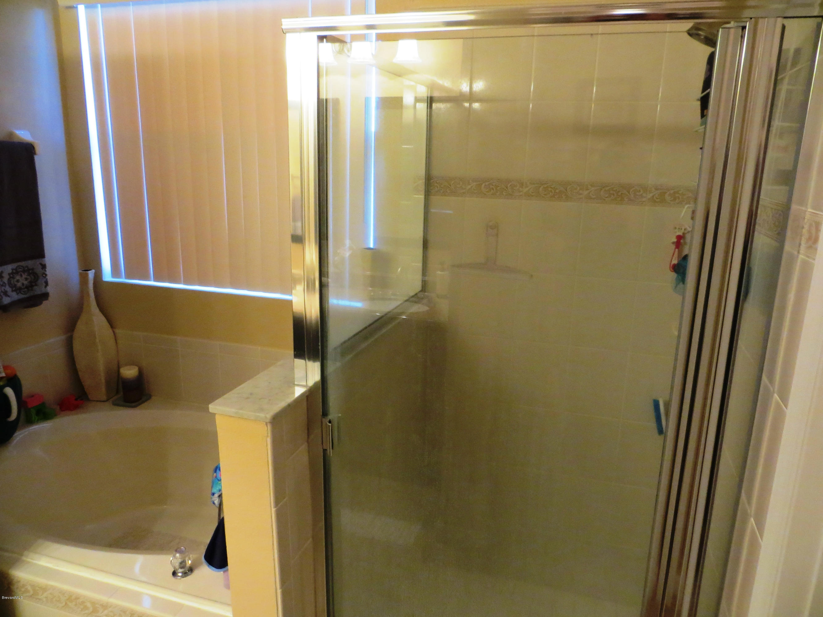 1295 Gerry Road Southwest Palm Bay, FL 32908 - Photo 20 of 28 Master tub with walk in shower