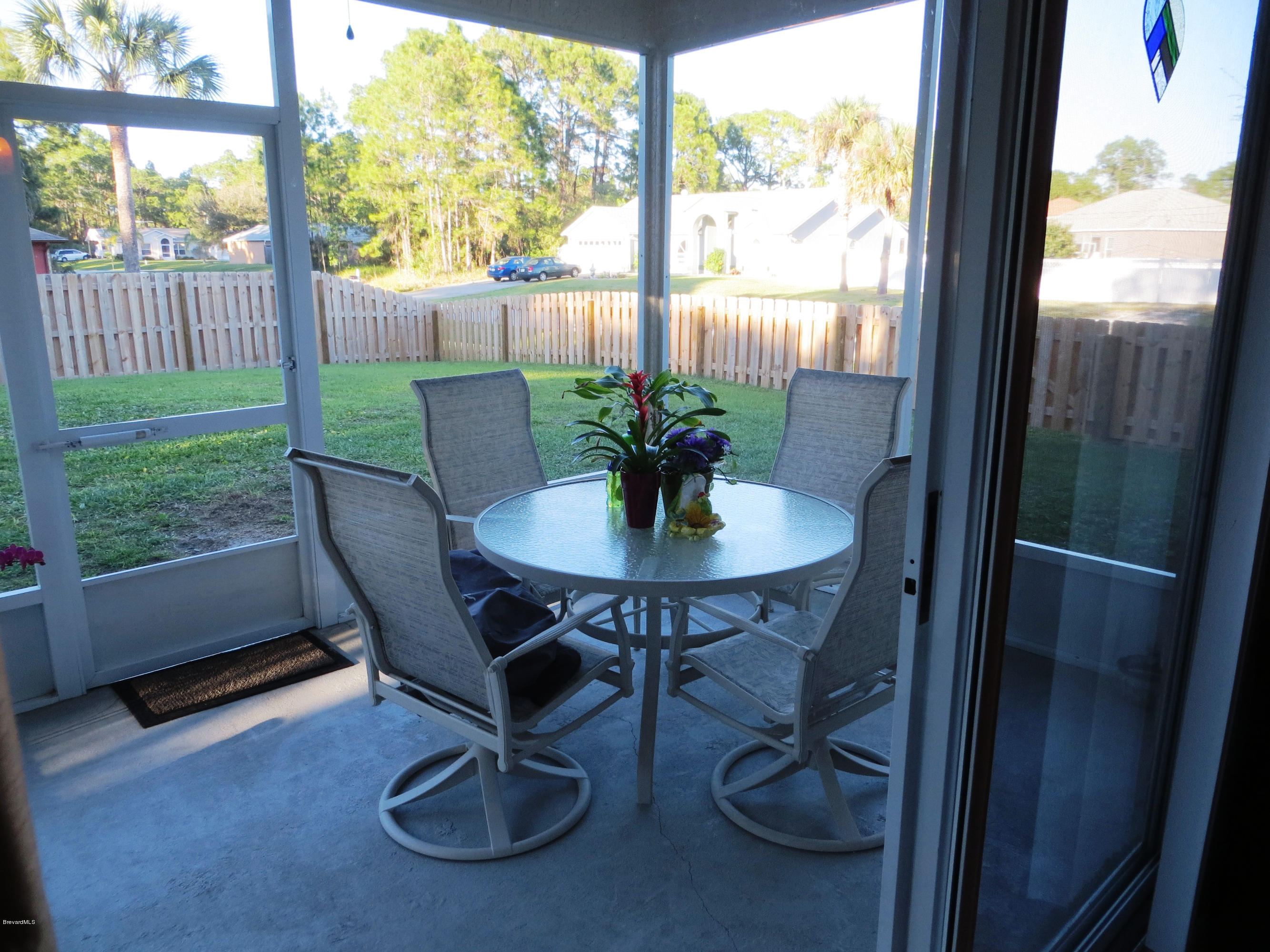 1295 Gerry Road Southwest Palm Bay, FL 32908 - Photo 26 of 28 Screened Porch