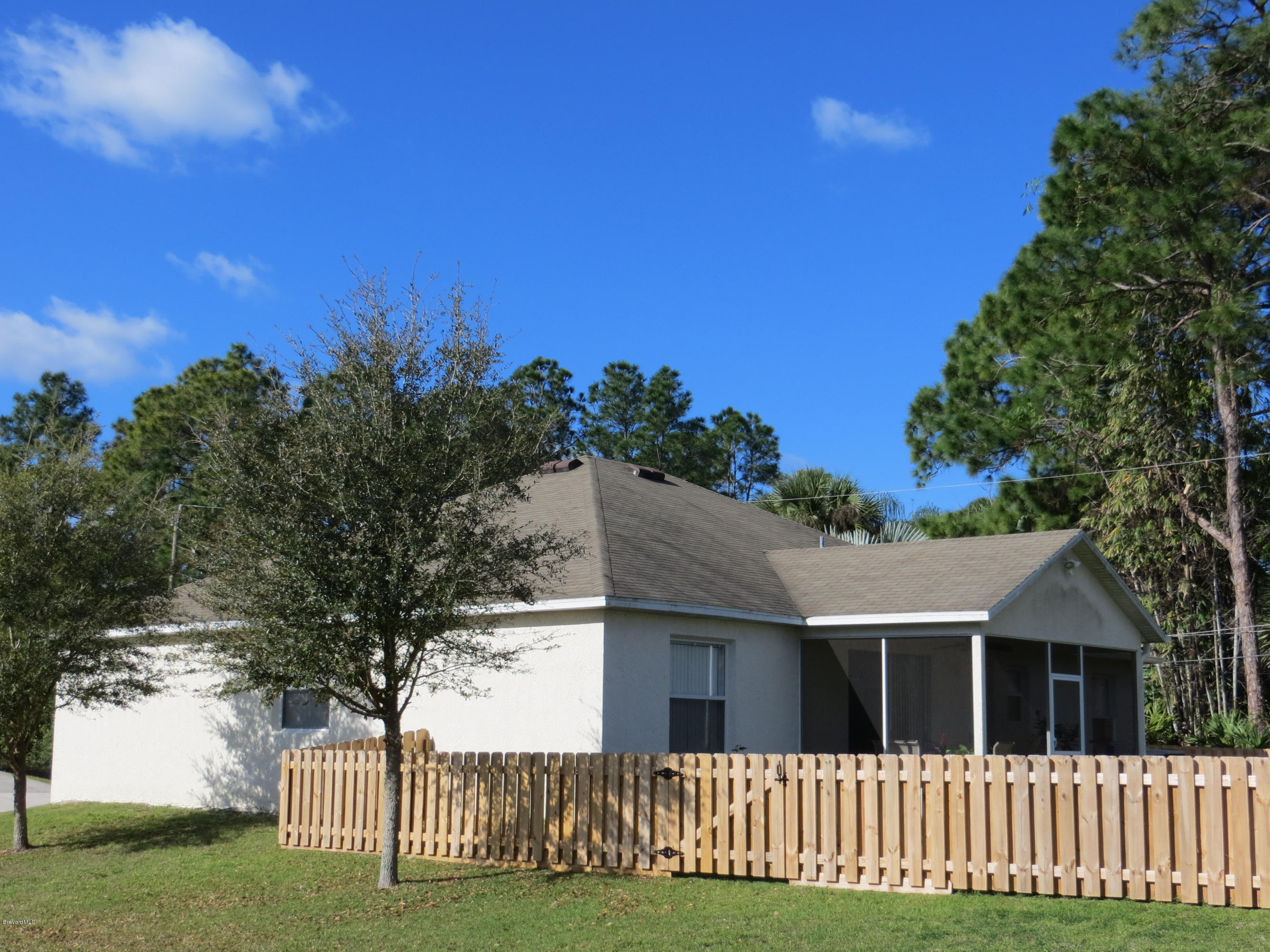 1295 Gerry Road Southwest Palm Bay, FL 32908 - Photo 27 of 28 Side/rear view of home