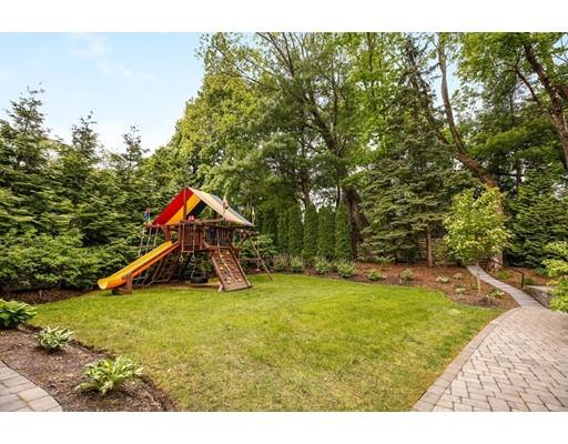 41 Redwood Road Newton, MA 02459 - Photo 40 of 42 a view of an house with swimming pool and garden