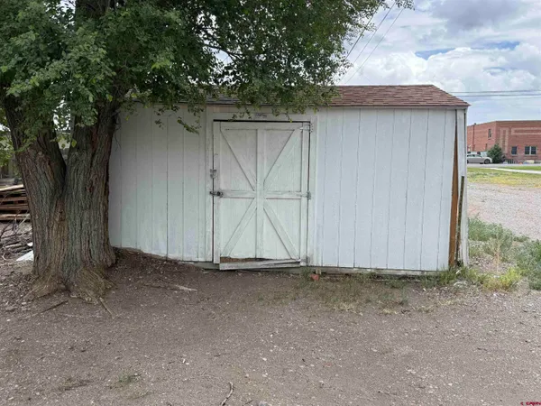 a view of an outdoor space and a house