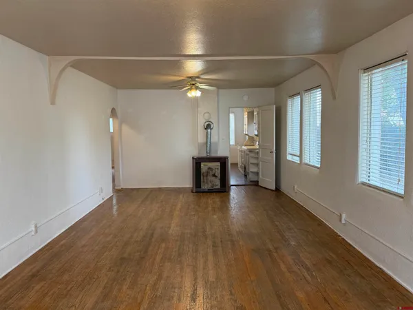 a view of a livingroom with wooden floor