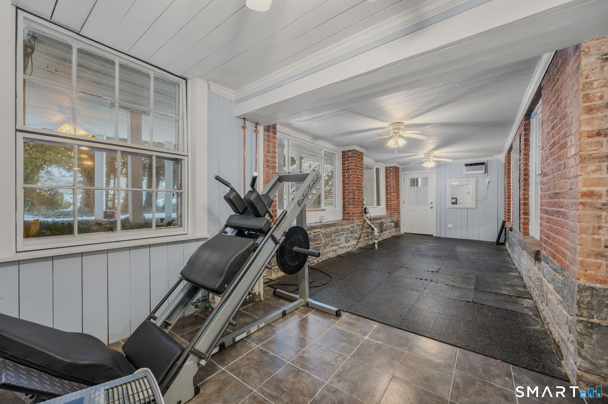 9 Lyme Street, Unit 2 Old Lyme, CT 06371 - Photo 25 of 29 a view of a room with gym equipment