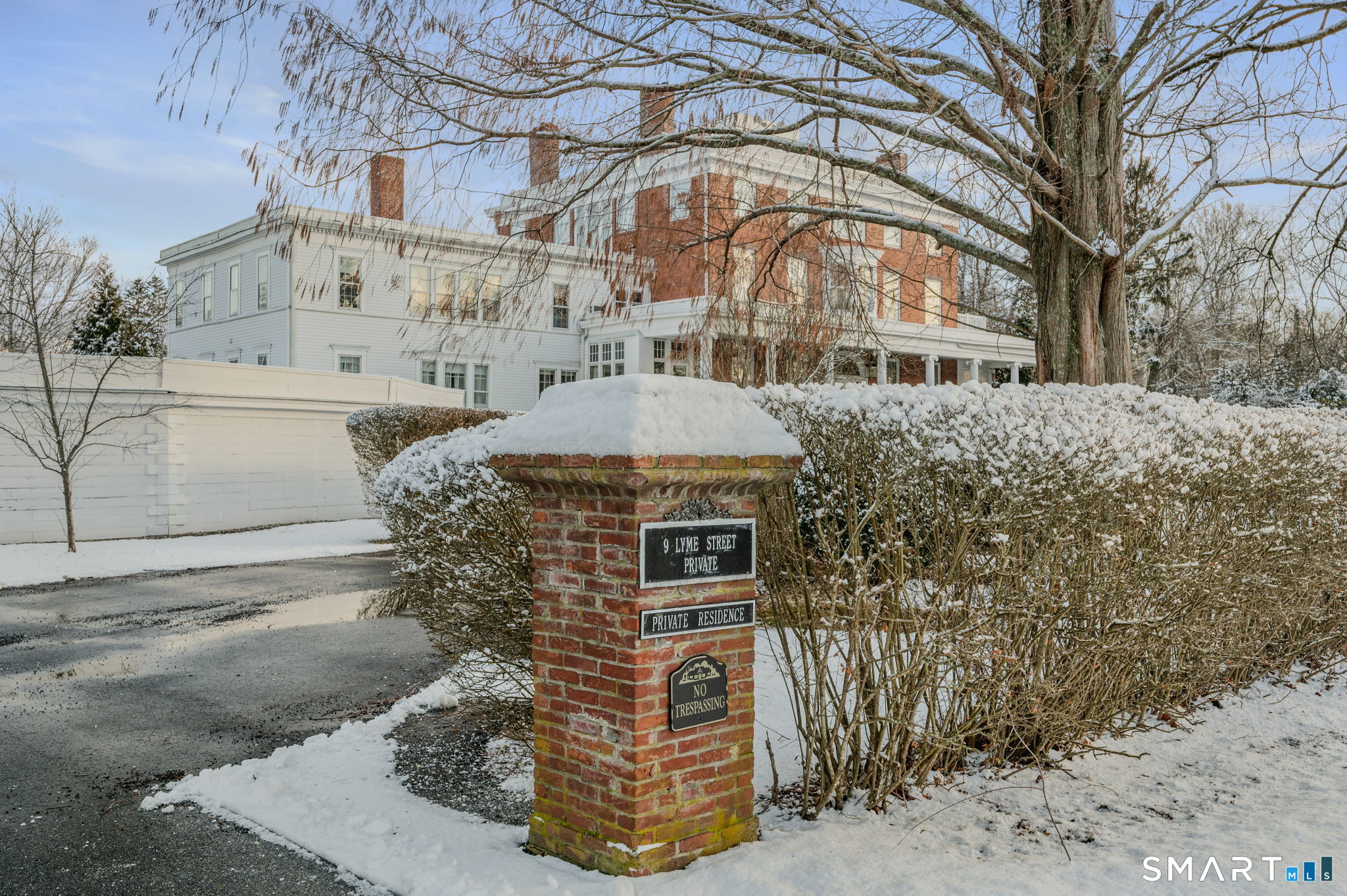 9 Lyme Street, Unit 2 Old Lyme, CT 06371 - Photo 3 of 29 a front view of a house with a yard