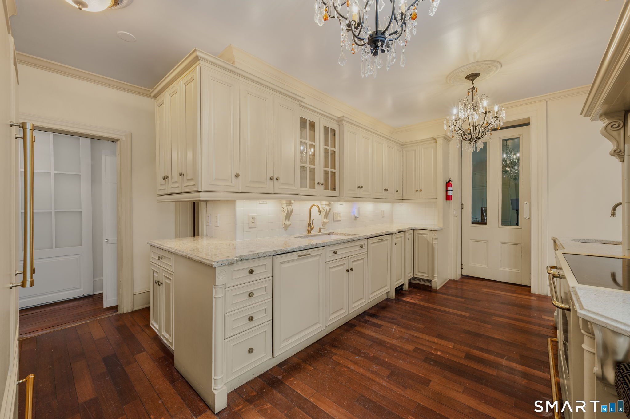 9 Lyme Street, Unit 2 Old Lyme, CT 06371 - Photo 5 of 29 a view of a kitchen with electric appliances