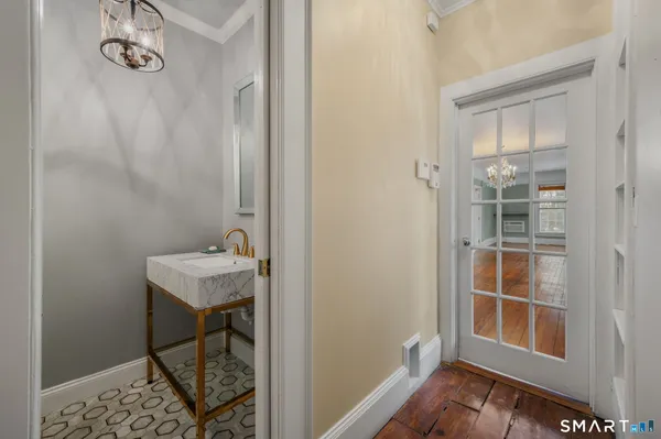a room that has a table and chair in it