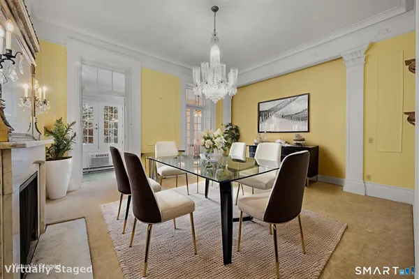 a view of a dining room with furniture