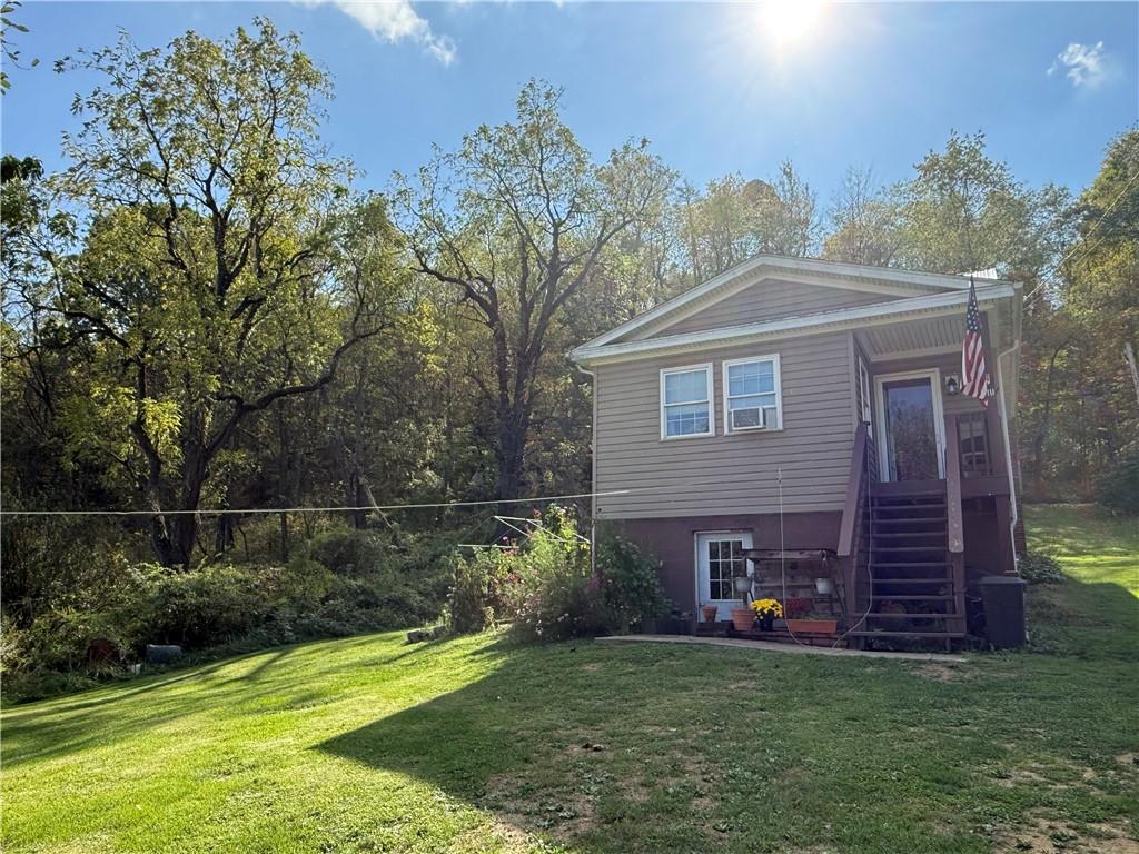 111 Fulton Lane Indiana, PA 15701 - Photo 20 of 20 a front view of a house with a garden