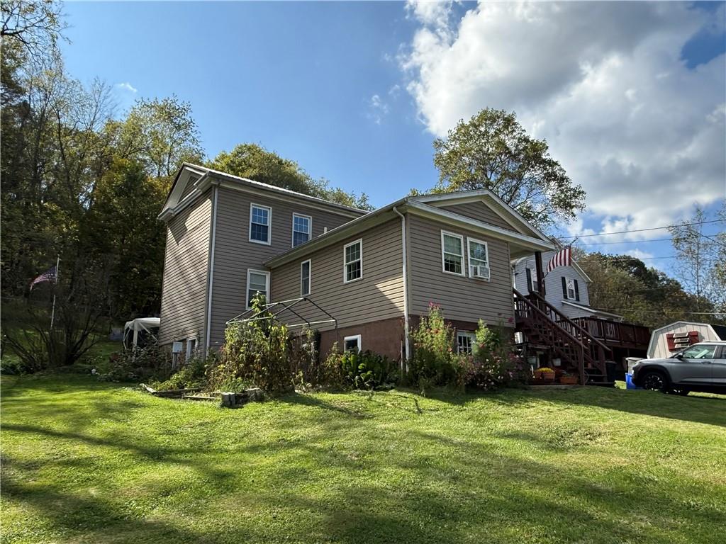 111 Fulton Lane Indiana, PA 15701 - Photo 2 of 20 a front view of a house with a garden