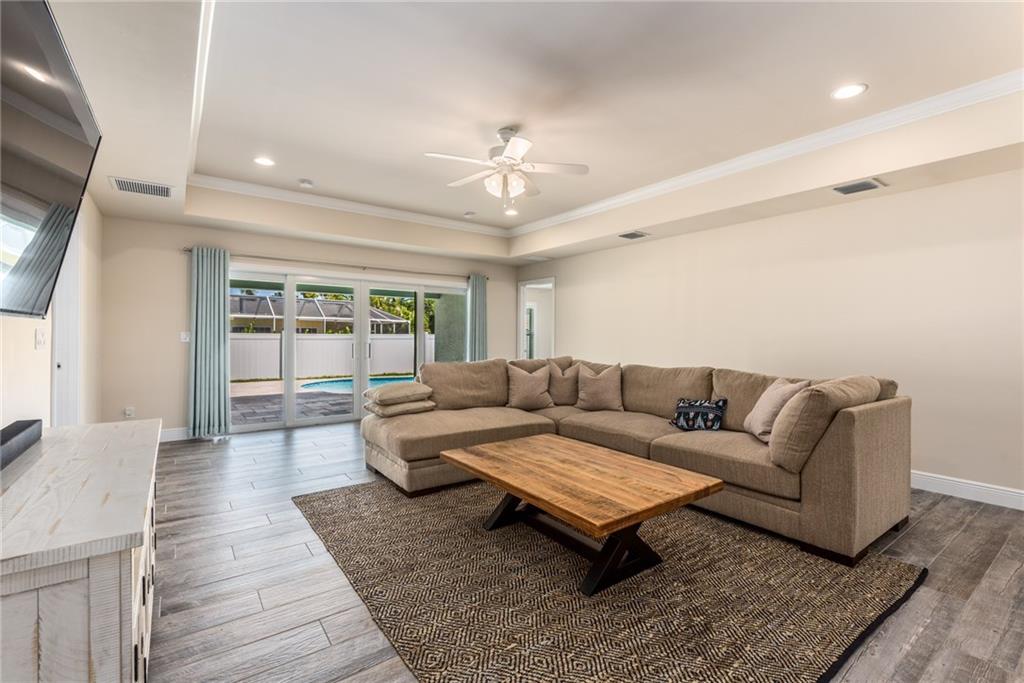 4833 Southeast Pilot Way Stuart, FL 34997 - Photo 11 of 37 a living room with furniture and wooden floor