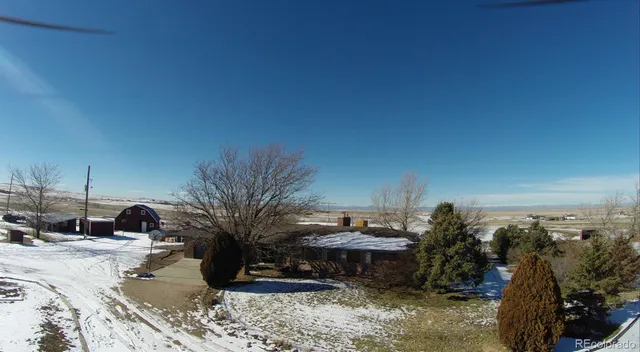 a kitchen with stainless steel appliances granite countertop a sink a stove and a microwave