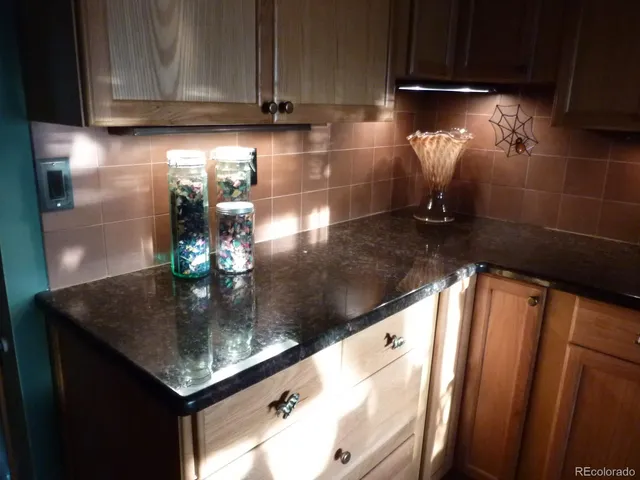 a view of dirt road with a stove