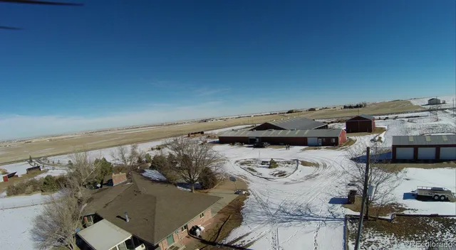 a view of roof with furniture