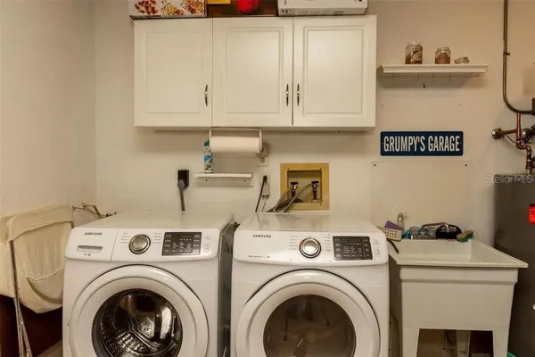 a utility room with dryer and washer
