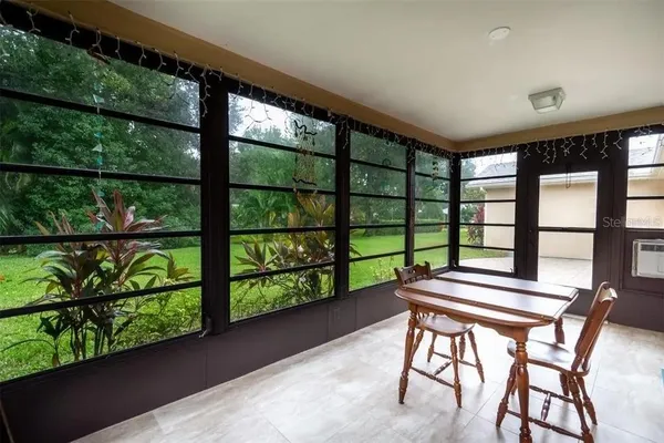 a view of a balcony with chairs