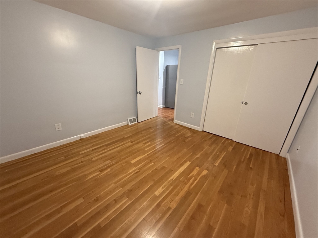 7 Champlain Road, Unit 1 Salem, MA 01970 - Photo 8 of 11 a view of an empty room