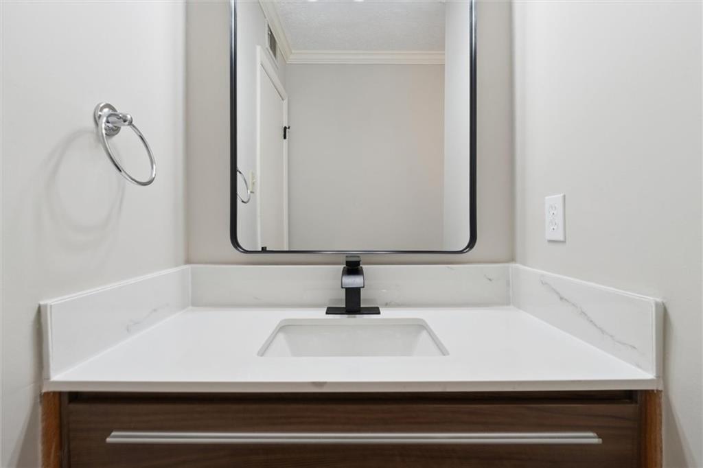 6700 Roswell Road, Unit 31B Atlanta, GA 30328 - Photo 15 of 32 a close view of a sink and tap