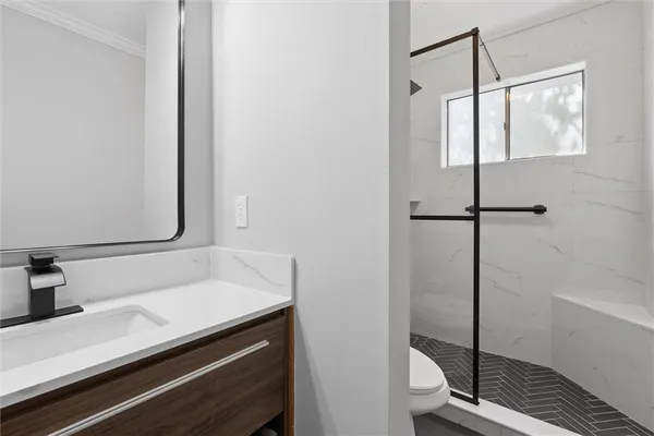 a bathroom with a sink and a shower