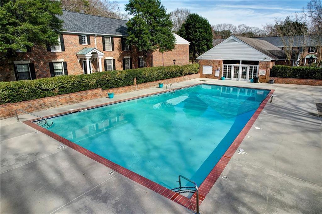 6700 Roswell Road, Unit 31B Atlanta, GA 30328 - Photo 26 of 32 a view of house with yard